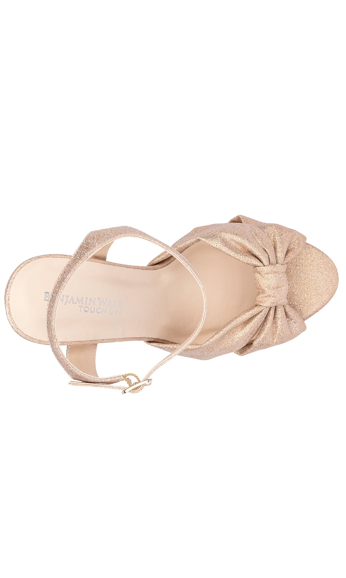 Top view of the Sailor Champagne Shimmer Shoes by Touch Ups 4662—a gold glittery open-toe sandal with bow detail and ankle strap with buckle, perfect for prom.
